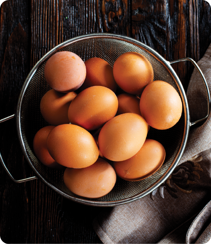 Free range eggs in a metal bowl